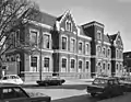 1913–1990: Gebäude Doezastraat/Ecke Raamsteeg