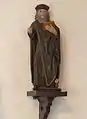 Die linke Statue