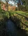 Betonrohr am Ende des Bachlaufs