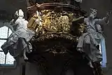 Kanzelkorb mit den Evangelisten Johannes und Lukas, in der Mitte die Darstellung der Bergpredigt