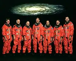 v. l. n. r. Michael Foale, Claude Nicollier, Scott Kelly, Curtis Brown, Jean-Francois Clervoy, John Grunsfeld, Steven Smith