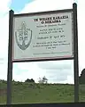 Schild der Kirche mit Hinweis auf die Schlacht