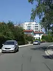 Einfamilienhäuser und Hochhaus an der Sauerbruchstraße