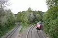 Nordausfahrt mit Neigetechnik-Nahverkehrstrieb-wagen Baureihe 612 nach Marktredwitz, links das Bayreuther Gleis