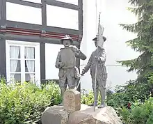 Schnadedenkmalmit Johannes Martini und Heinrich Schieferecke