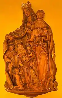 Schutzmantelmadonna mit vier Menschen unter dem Schutzmantel der Heiligen Maria
