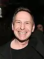 Scott Thompson spielt Dr. Jimmy Price