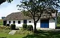 Rekonstruktion des Elternhauses von Martinus