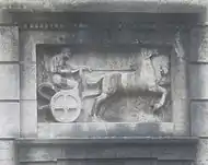 Wagenlenkerrelief.