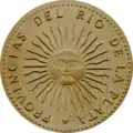 Erste Münze Argentiniens, Rückseite, mit der Sol de Mayo, 1813 (1991 neugestaltet)