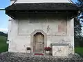 Klebdach an der Westseite der Kirche St. Dionys (SG)