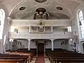 Westseite:Emporen und Pröbstl-Orgel