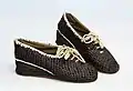 Schuhe aus PVC-Folienstreifen, um 1947
