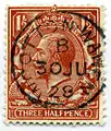 1½d-Briefmarke mit Georg V. aus dem Jahr 1912; 1928 in Wootton Wawen in der Grafschaft Warwickshire verwendet.