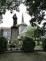 Jesus-Statue auf dem Sockel des Denkmals für die Gefallenen des Ersten Weltkriegs