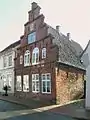Das Backsteinhaus mit Stufengiebel von 1619 in der Neustadt