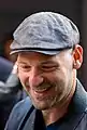 Corey Stoll spieltBuzz Aldrin