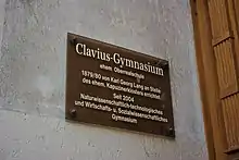 Clavius-Gymnasium ehem. Oberrealschule. 1879/80 von Karl Georg Lang anstelle des ehem. Kapuzinerklosters errichtet. Seit 2004 Naturwissenschaftlich-technologisches und Wirtschafts- und Sozialwissenschaftliches Gymnasium