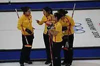Die Frauenmannschaft 2010 im Vorrundenspiel gegen Dänemark (v.&nbsp;l.&nbsp;n.&nbsp;r.): Skip Wang Bingyu, Third Liu Yin, Lead Zhou Yan und Second Yue Qingshuang