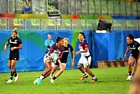 Szene aus dem Viertelfinale 2016 zwischen Neuseeland (schwarz) und USA (weiß/blau)