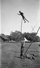 Indian man holding his companion up …