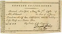 Subskriptionsquittung über 15 £ für den Bau eines Kaffee-Hauses nach dem Tontinen-Plan, ausgestellt in New York am 7. Mai 1792, eigenhändig unterschrieben von David Grim, dem Oberbauleiter. 1817 wurde der Börsenhandel aus dem Kaffeehaus in ein größeres Gebäude in der Wall Street verlegt.