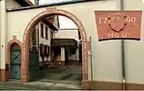 Toreinfahrt mit Jahreszahl-Schlussstein beim ehem. Orbhof