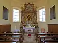 Blick auf den Altar im Innenraum der Dreifaltigkeitskapelle