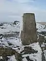 Der trigonometrische Punkt auf dem südlichen Gipfel des Ben Vorlich, der zwei Meter niedriger als der höchste Punkt ist.