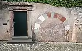 Keller und Torbogen
