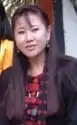 Tshering Yangdon. Eine junge Frau mit langen glatten Haaren.