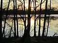 Sonnenuntergang im zeitigen Frühjahr