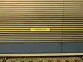 Stationsname an den Hintergleiswänden