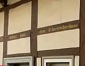 Balkeninschrift zum Alter und zur Funktion