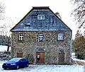 Bruchstein-Wohngebäude