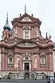 Katholische Neumünsterkirche, ehemaliges Kollegiatstift, erste Bischofskirche über den Gräbern der Frankenheiligen im 8. Jahrhundert, 855 Zerstörung, Neugründung als Stift St. Johannes, Maria und Kilian 1060, katholische Pfarrkirche Neumünster seit 1808