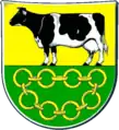Wanderup ist ein Zentrum der „Schwarz-bunten-Zucht“ in Schleswig-Holstein. Die in schwarz-silberner Tinktur stehend und lebhaft gezeichnete Kuh gibt ein Bild davon.