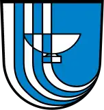 In Blau vorn bis zur Schildmitte am rechten Schildrand beginnend drei unten, nach hinten gebogene und in einem Punkt des linken Schildrandes auslaufende silberne (weiße) Pfähle, in der Schildmitte eine Schale in verwechselten Farben(Karlsbad/Baden, DE)