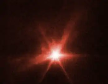Auswurfmaterial nach dem DART-Einschlag durch das James-Webb-Weltraumteleskop.