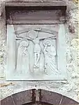 St. Nicolai in Rethen (Landkreis Gifhorn), Nachbildung über dem Eingangsportal.(Das undatierte Original, um 1500, befindet sich in der Kirche.)