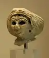 Kopf einer Frauenfigur aus Mari