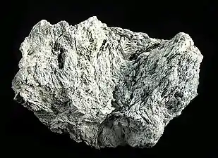 Blättriger Kaolinit mit Zinkenit aus der Itos Mine, Oruro, Bolivien Größe: 6,9 × 4,9 × 3,0 cm
