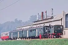 Dampflok mit drei Wagen