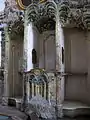Offener Beichtstuhl in Form einer Grotte