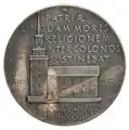 Die Rückseite der von Erik Lindberg gestalteten Medaille zeigt die Kirche in Raccoon